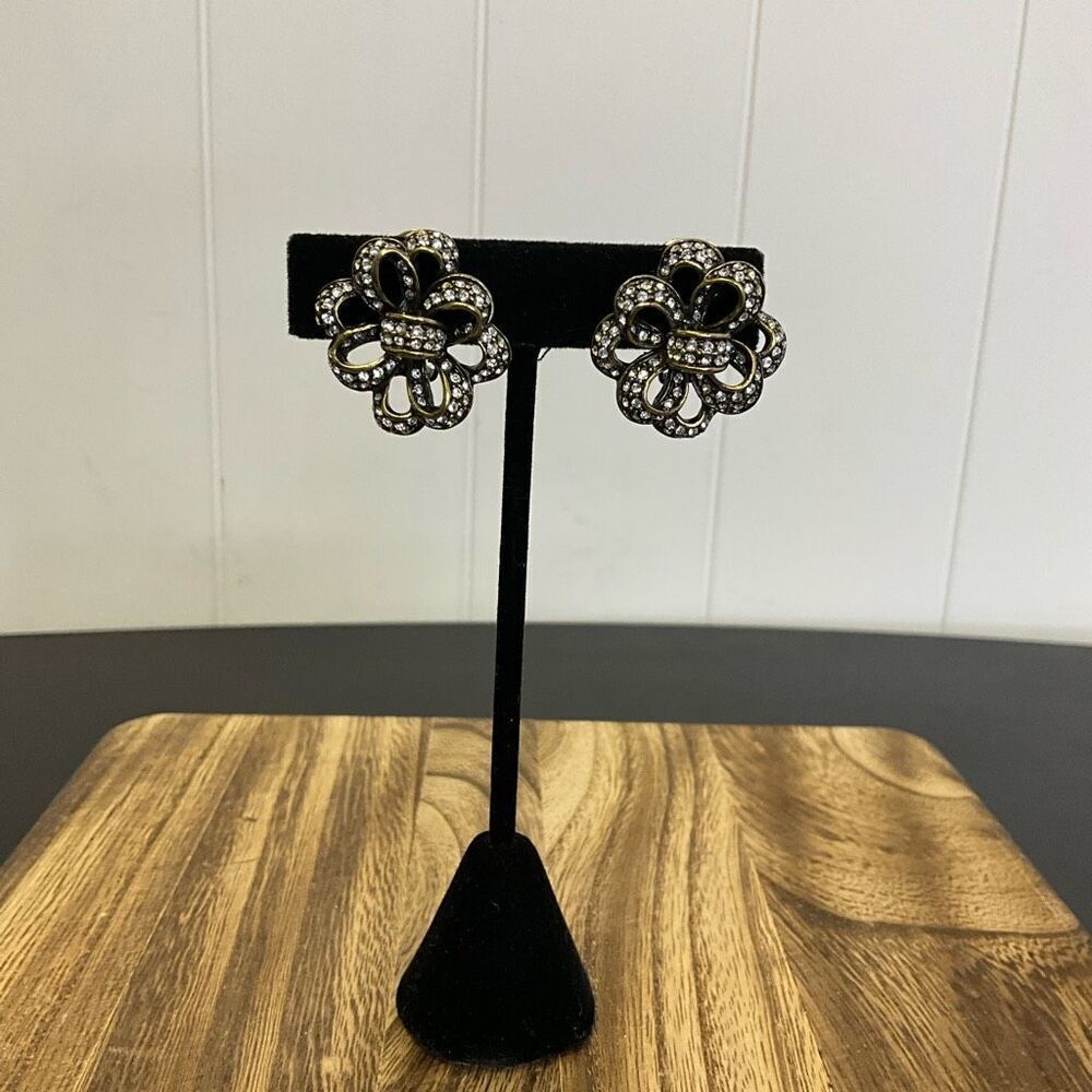 Vintage Heidi Daus Silver Rhinestone Embellised Rattan Bow Clip Earrings Stateme